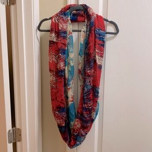 Multicolored Infinity scarf. Red, cream, and shades of blue. Great condition.